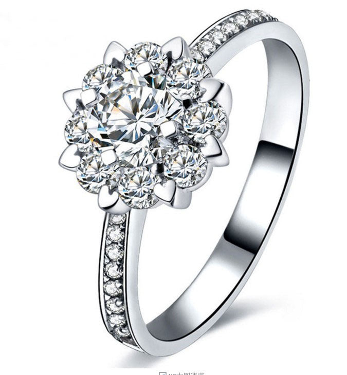 Elegant 18K Star Diamond Ring